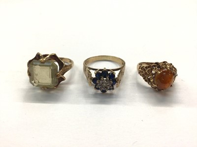 Lot 1030 - Three 9ct gold gem set dress rings