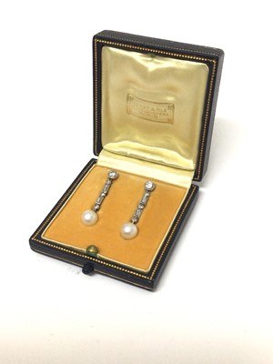 Lot 818 - Fine pair of diamond and cultured pearl earrings