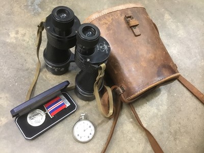 Lot 153 - WW2 National Service Medal, Bravingtons stopwatch with broad arrow mark, and a pair of binoculars in case with broad arrow mark (3)