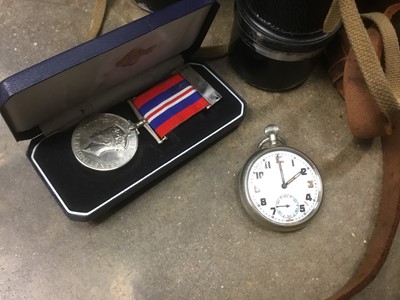 Lot 153 - WW2 National Service Medal, Bravingtons stopwatch with broad arrow mark, and a pair of binoculars in case with broad arrow mark (3)