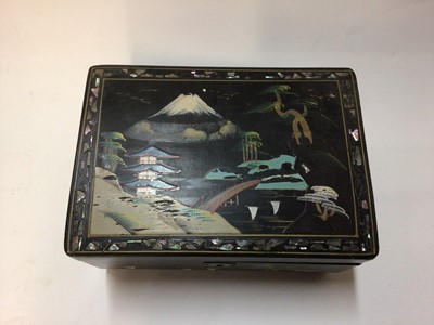 Lot 29 - Oriental lacquer writing box with drawer, together with an oriental lacquer music box (2)