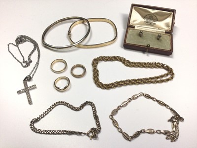 Lot 64 - 9ct white gold cross pendant on chain, three 9ct gold rings, two 9ct gold bangles, 9ct gold rope twist necklace, two 9ct gold bracelets and pair of yellow metal studs