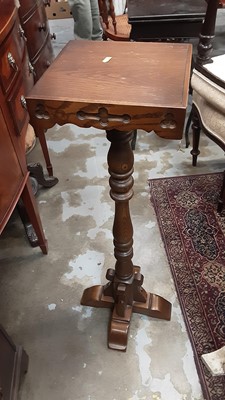 Lot 1203 - Old Charm oak plant stand, 93cm high, together with another plant stand, 90.5cm high and an occasional table (3)