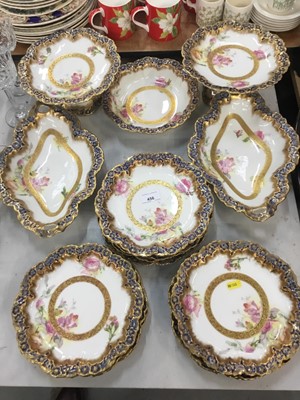 Lot 456 - Good quality Limoges dessert service with printed rises and moulded borders comprising 11 plates, pair comports and three fruit dishes - 16 pieces