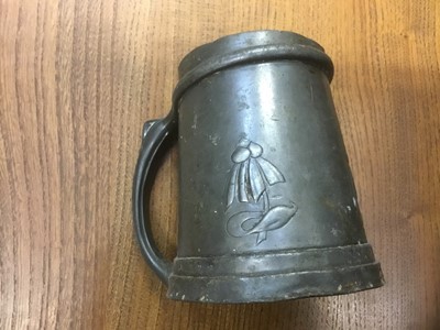 Lot 164 - Tudric art nouveau tankard, in the manner of Knox. Numbered 053