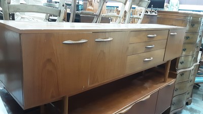 Lot 1245 - Mid 20th century teak sideboard, possibly G-Plan with three drawers and three cupboard doors, 203.5cm wide, 43cm deep, 71cm high