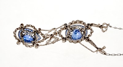 Lot 620 - Fine early 20th century Belle Époque sapphire and diamond necklace, the principal oval mixed cut cornflower blue sapphire estimated to weigh approximately 8.40 carats, in millegrain collet setting...