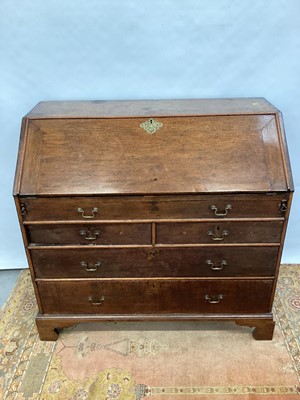 Lot 1507 - Early 18th century oak bureau.