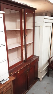 Lot 1251 - Victorian stained pine kitchen cupboard with original grained finish, shelves above enclosed by two glazed doors, frieze drawer and two panelled doors below, 111cm wide, 45.5cm deep, 213cm high