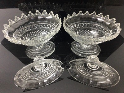 Lot 207 - Pair of Regency cut glass urns and covers