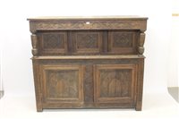 Lot 1121 - 17th century-style Carsved oak court cupboard...