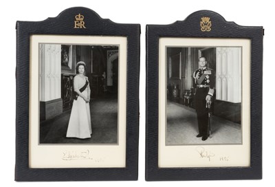 Lot 73 - H.M.Queen Elizabeth II & H.R.H.The Duke of Edinburgh, fine pair signed presentation portrait photographs of the Royal couple