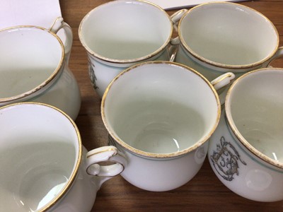 Lot 68 - French porcelain six-person custard cup set, on stand, marks to bases