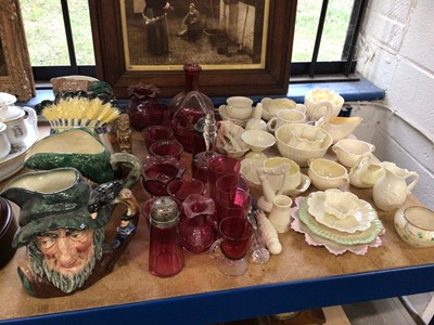 Lot 69 - Collection of Belleek, together with a group of cranberry glass and four Doulton character jugs