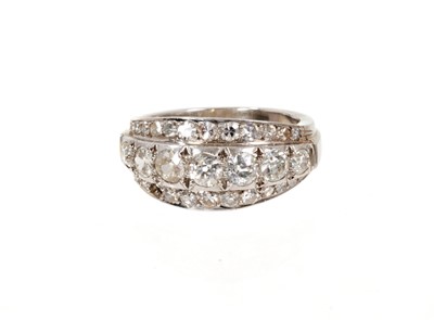 Lot 670 - Platinum and diamond three row ring