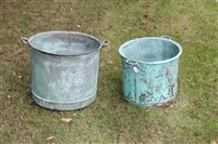 Lot 1129 - Two graduated copper vessels, each of riveted...