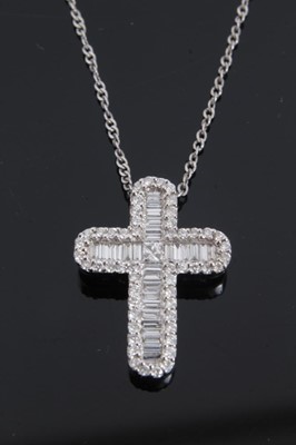 Lot 683 - Diamond cross pendant on silver chain