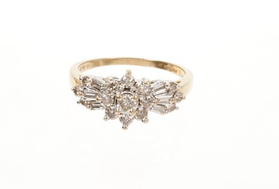 Lot 686 - Diamond cluster ring with a flower head cluster of brilliant cut diamonds flanked by baguette cut and brilliant cut diamonds to the shoulders