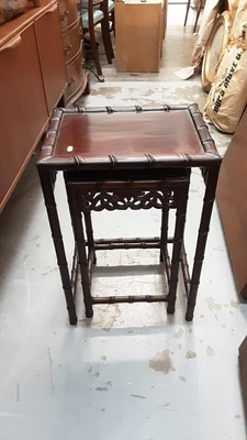 Lot 1302 - Oriental hardwood nest of two occasional tables