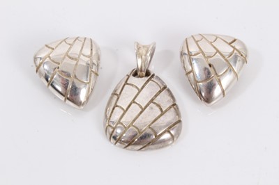 Lot 691 - Tiffany & Co. 1996 silver crocodile print pendant and pair of matching clip earrings