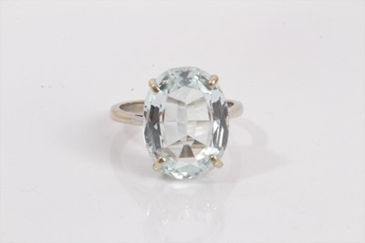 Lot 692 - Aquamarine single stone cocktail ring with an oval mixed cut aquamarine in 9ct white gold setting