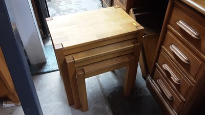 Lot 1308 - Contemporary light oak nest of three tables, matching coffee table and a small bookcase (3)