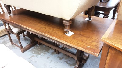 Lot 1315 - Old Charm oak refectory table on pierced end standards joined by stretcher and a set of six matching dining chairs comprising two carvers and four standards