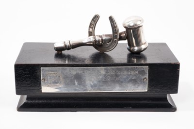 Lot 1118 - Racing trophy in the form of a gavel and horseshoe, white metal, mounted on an ebonised plinth with applied silver plaque 'Mares Only Final, Sandown 2004', 16cm x 8.5cm