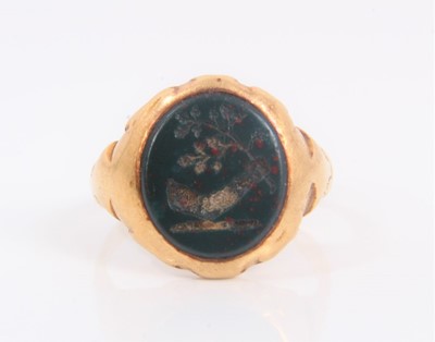 Lot 808 - Victorian gold signet ring with a intaglio hardstone bezel