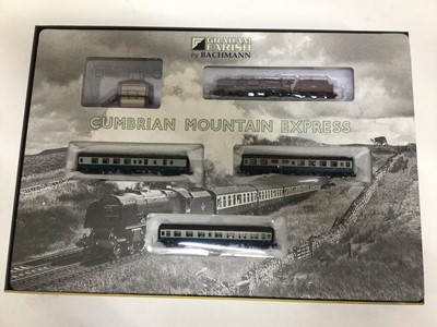 Lot 1 - Bachmann n gauge boxed sets Pride of Britain 66731 "Captain Tom Moore", 371-396K, Longmoor Military Railway 370-400 and Cumbrian Mountain Express 370-500 (3)