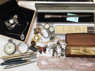 Lot 1054 - Costume jewellery, wristwatches, silver napkin ring, silver handled letter opener, various pens and bijouterie