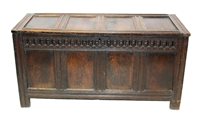 Lot 1143 - 17th century oak coffer of large proportions,...