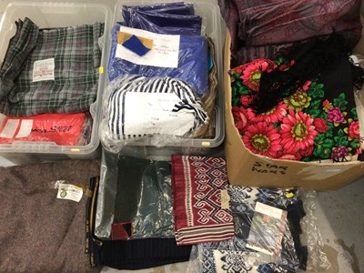 Lot 381 - Three boxes of soft furnishings fabrics including two large rolls, lengths of tweed, Jasper Conran fabrics, cushion covers and other textiles