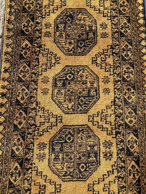 Lot 1358 - Afghan gold and blue runner, 245cm x 74cm