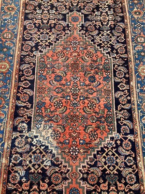 Lot 1360 - Iranian red and blue rug, 202.5cm x 131cm