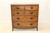 Lot 1147 - Regency mahogany chest of drawers with two...