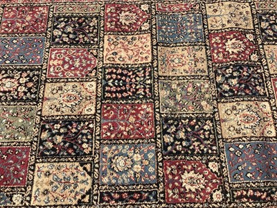 Lot 1364 - Rug with floral decoration, 216cm x 159.5cm