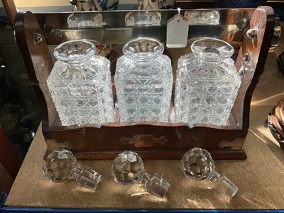 Lot 222 - Edwardian tantalus with three hobnail cut glass decanters in silver mounted oak case