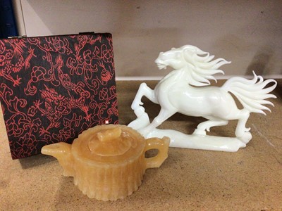 Lot 401 - Chinese carved jade-type horse ornament and similar teapot in case