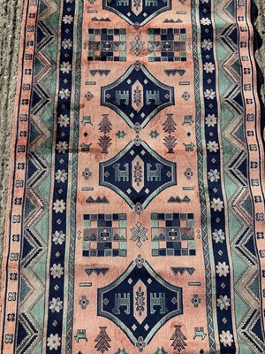 Lot 1375 - Part silk runner with geometric decoration on turquoise and peach ground, 224cm x 69.5cm