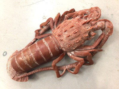 Lot 404 - Carved orange/red hardstone crayfish, 31.5cm long