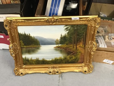 Lot 550 - Oil on board, alpine lake scene in gilt frame