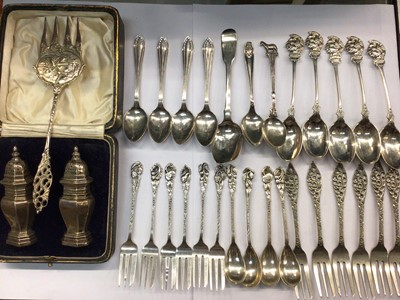 Lot 1089 - Pair of silver casters, various silver teaspoons, South African plated spoons and forks etc