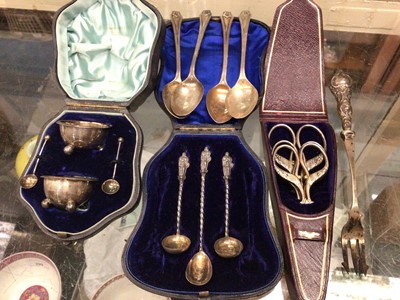 Lot 1121 - Pair silver salts and spoons in case, four silver teaspoons, three silver Apostle salt spoons in case, silver handled fork and some scissors