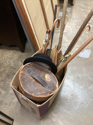 Lot 922 - Shooting sticks, canes, croquet mallets, etc, a boxed top hat and a bowler hat