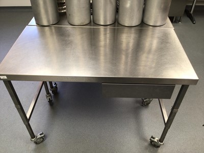 Lot 14 - A stainless steel freestanding preparation bench, with drawer, on castors, 1200 mm