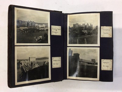 Lot 1425 - Vintage postcards and two old photograph albums. Postcards cards include real photographic 1928 Solent Queen with passengers, 1933 Bournemouth beach scenes