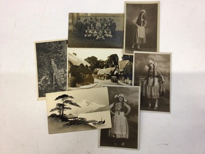 Lot 1425 - Vintage postcards and two old photograph albums. Postcards cards include real photographic 1928 Solent Queen with passengers, 1933 Bournemouth beach scenes