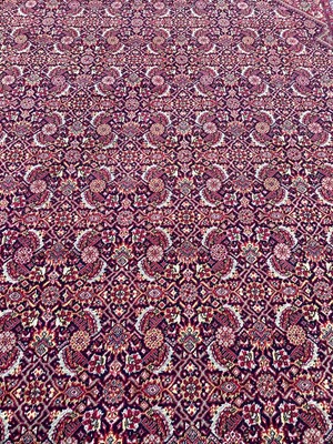 Lot 1400 - Large red and blue carpet, 370cm x 272cm