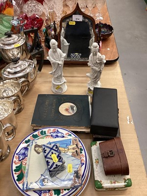 Lot 514 - Two Chinese Blanc de chine figures, together with a stamp album, album of crests and other items